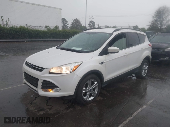 2016 Ford Escape SE with VIN 1FMCU0GX4GUC23998, listed as a IAAI auction lot 41917522 with 96,491 mi miles and . Bid and sale history available at carsss.com. Image 2.