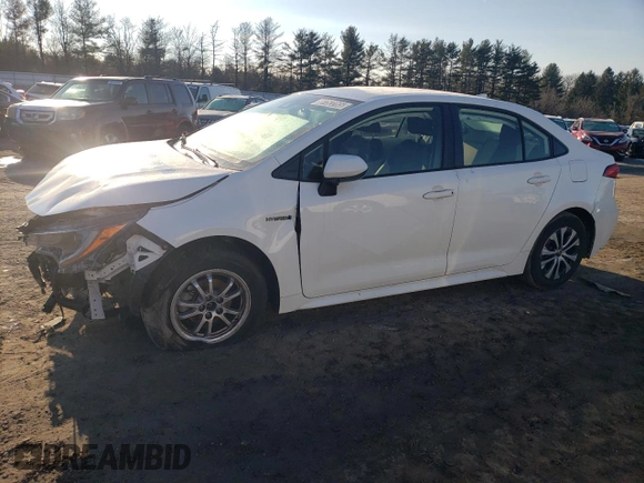 2021 Toyota Corolla Hybrid LE with VIN JTDEAMDE5MJ011169, listed as a Copart auction lot 88752265 with 52,994 mi miles and Salvage Title. Bid and sale history available at carsss.com. Image 1.