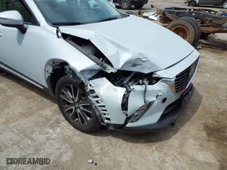 2017 Mazda CX-3 Grand Touring with VIN JM1DKFD78H0160564, listed as a IAAI auction lot 39236942 with 50,921 mi miles. Bid and sale history available at carsss.com. Image 6.