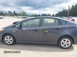 2015 Toyota Prius Four with VIN JTDKN3DU2F1997353, listed as a IAAI auction lot 42181646 with 143,538 mi miles and . Bid and sale history available at DreamBid. Image 14.