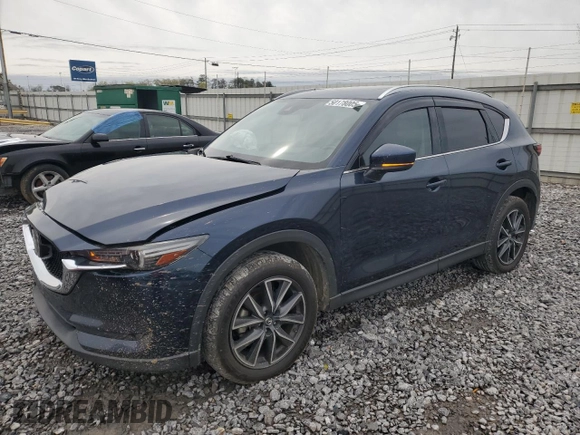 2017 Mazda CX-5 Grand Touring with VIN JM3KFADL3H0125143, listed as a Copart auction lot 50178005 with 160,058 mi miles and Salvage Title. Bid and sale history available at carsss.com. Image 1.