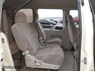 1997 Nissan Quest XE with VIN 4N2DN1119VD816959, listed as a IAAI auction lot 41144452 with 113,925 mi miles. Bid and sale history available at carsss.com. Image 8.