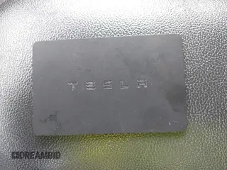 2018 Tesla Model 3 Long Range Battery with VIN 5YJ3E1EA8JF154738, listed as a IAAI auction lot 41013807 with 115,488 mi miles and . Bid and sale history available at DreamBid. Image 11.