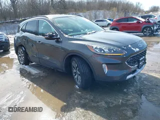 2020 Ford Escape Titanium Hybrid z VIN 1FMCU0DZ9LUA61625, wystawiony jako IAAI lot #41839124 z przebiegiem 75 970 mil mil oraz . Historia ofert i sprzedaży dostępna na DreamBid. Obrazek 1.