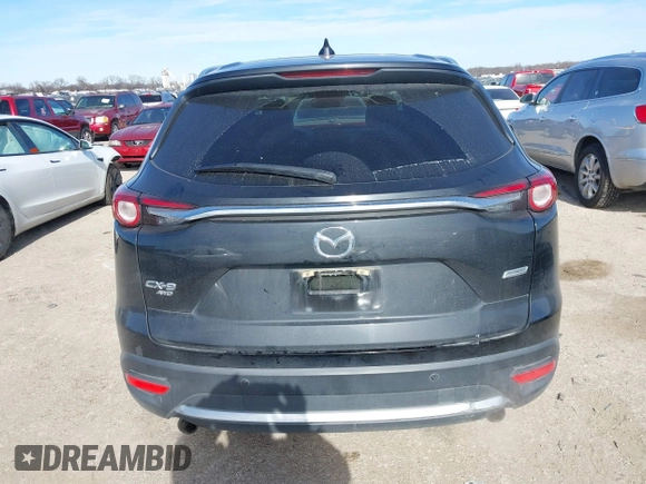2017 Mazda CX-9 Grand Touring with VIN JM3TCBDYXH0131388, listed as a IAAI auction lot 41252943 with 61,027 mi miles. Bid and sale history available at carsss.com. Image 16.