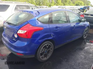 2013 Ford Focus SE with VIN 1FADP3K27DL167849, listed as a IAAI auction lot 42148109 with 127,872 mi miles and . Bid and sale history available at carsss.com. Image 4.