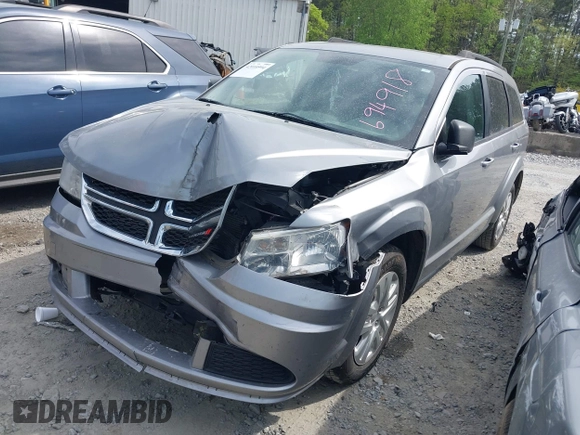 2017 Dodge Journey SE z VIN 3C4PDCAB0HT694918, wystawiony jako IAAI lot #42010594 z przebiegiem 135 432 mil mil oraz . Historia ofert i sprzedaży dostępna na DreamBid. Obrazek 17.