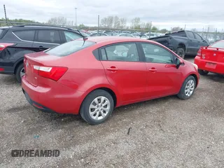 2012 Kia Rio LX with VIN KNADM4A30C6094000, listed as a IAAI auction lot 42059778 with 127,957 mi miles. Bid and sale history available at carsss.com. Image 4.