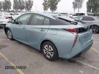 2017 Toyota Prius Two with VIN JTDKARFU7H3052594, listed as a IAAI auction lot 42035969 with 50,789 mi miles and . Bid and sale history available at DreamBid. Image 3.