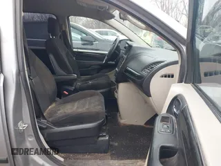 2014 Dodge Grand Caravan American Value with VIN 2C4RDGBG9ER187198, listed as a IAAI auction lot 41669334 with 204,803 mi miles and . Bid and sale history available at DreamBid. Image 5.