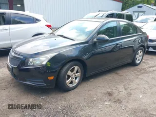2014 Chevrolet Cruze 1LT with VIN 1G1PC5SB8E7210158, listed as a IAAI auction lot 42729599 with 106,400 mi miles and . Bid and sale history available at DreamBid. Image 2.