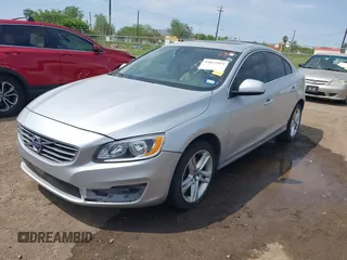 2015 Volvo S60 T5 Drive-E Premier with VIN YV140MFK5F1344597, listed as a IAAI auction lot 41822415 with 103,301 mi miles and . Bid and sale history available at DreamBid. Image 2.