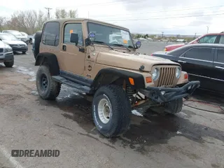 1999 Jeep Wrangler Sahara with VIN 1J4FY49S6XP437964, listed as a IAAI auction lot 41947995 with 118,566 mi miles. Bid and sale history available at carsss.com. Image 1.