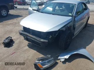 2013 Volkswagen Jetta SE with VIN 3VWDX7AJ3DM404990, listed as a IAAI auction lot 42584934 with 164,126 mi miles and . Bid and sale history available at DreamBid. Image 6.