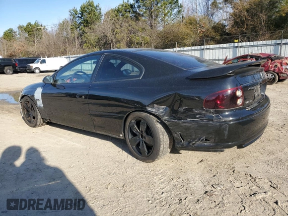 2004 Pontiac GTO z VIN 6G2VX12G74L249425, wystawiony jako Copart lot #48103235 z przebiegiem 106 334 mil mil oraz Szkoda całkowita • Salvage title. Historia ofert i sprzedaży dostępna na DreamBid. Obrazek 2.