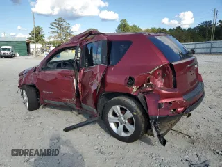 2011 Jeep Compass with VIN 1J4NT1FB4BD194839, listed as a Copart auction lot 73001014 with 113,050 mi miles and Salvage Title. Bid and sale history available at carsss.com. Image 2.