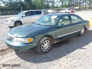 2000 Lincoln Continental with VIN 1LNHM97VXYY759969, listed as a IAAI auction lot 41892082 with 114389 miles. Bid and sale history available at carsss.com. Image 17.