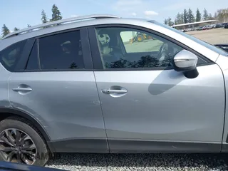 2016 Mazda CX-5 Grand Touring with VIN JM3KE4DYXG0647802, listed as a IAAI auction lot 41996854 with 85,774 mi miles. Bid and sale history available at carsss.com. Image 13.