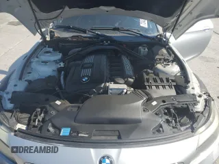 2011 BMW Z4 sDrive30i with VIN WBALM5C59BE379511, listed as a Copart auction lot 73425184 with 70,981 mi miles and Salvage Title. Bid and sale history available at carsss.com. Image 11.