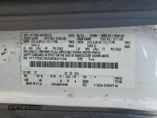2016 Ford Transit Cargo z VIN 1FTYR2CM3GKB31134, wystawiony jako Copart lot #70293794 z przebiegiem 65 457 mil mil oraz Szkoda całkowita • Salvage title. Historia ofert i sprzedaży dostępna na DreamBid. Obrazek 13.