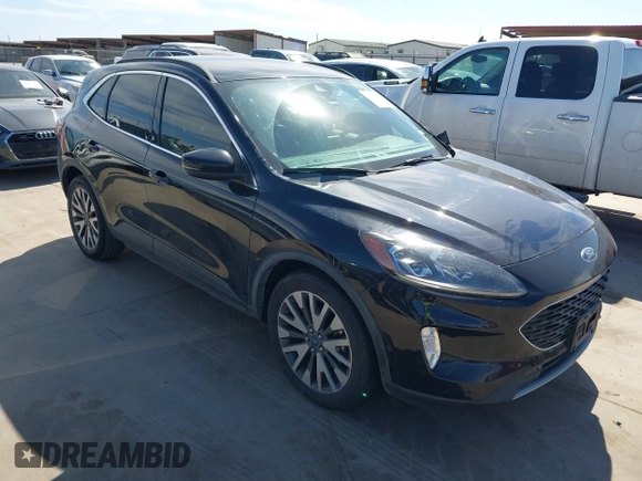 2020 Ford Escape Titanium Hybrid with VIN 1FMCU0DZ9LUC08090, listed as a IAAI auction lot 41674697 with 43,586 mi miles and . Bid and sale history available at DreamBid. Image 1.