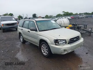 2005 Subaru Forester XS with VIN JF1SG65665H727808, listed as a IAAI auction lot 42498843 with 179,223 mi miles and . Bid and sale history available at DreamBid. Image 1.