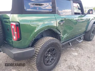2023 Ford Bronco with VIN 1FMEE5DP0PLB80676, listed as a IAAI auction lot 42210054 with 6,796 mi miles and . Bid and sale history available at DreamBid. Image 6.