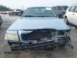 2003 Ford Crown Victoria LX z VIN 2FAFP74W83X180076, wystawiony jako IAAI lot #41744980 z przebiegiem 254 465 mil mil oraz . Historia ofert i sprzedaży dostępna na DreamBid. Obrazek 13.