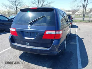 2007 Honda Odyssey LX with VIN 5FNRL38277B098798, listed as a IAAI auction lot 41998802 with 205,657 mi miles and . Bid and sale history available at carsss.com. Image 4.
