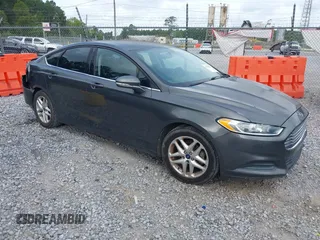 2015 Ford Fusion SE z VIN 3FA6P0H74FR102049, wystawiony jako IAAI lot #42343030 z przebiegiem 153 981 mil mil oraz . Historia ofert i sprzedaży dostępna na DreamBid. Obrazek 1.