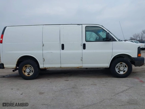 2011 Chevrolet Express Cargo Van with VIN 1GCWGFFA7B1108976, listed as a IAAI auction lot 40937070 with 296,821 mi miles. Bid and sale history available at carsss.com. Image 13.