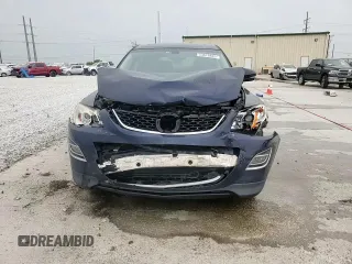 2012 Mazda CX-9 Grand Touring z VIN JM3TB2DA4C0359028, wystawiony jako Copart lot #53816845 z przebiegiem 148 848 mil mil oraz Szkoda całkowita • Salvage title. Historia ofert i sprzedaży dostępna na DreamBid. Obrazek 14.