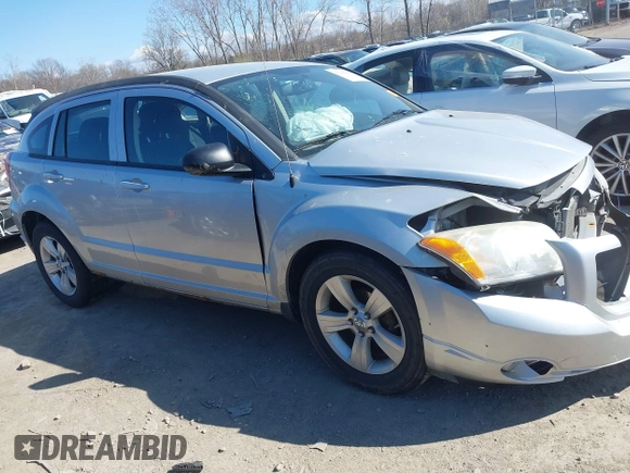 2011 Dodge Caliber Mainstreet with VIN 1B3CB3HA9BD295750, listed as a IAAI auction lot 42049996 with Not Provided miles. Bid and sale history available at carsss.com. Image 13.