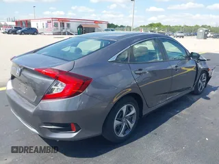 2020 Honda Civic LX with VIN 19XFC2F68LE007735, listed as a IAAI auction lot 42215294 with 3,849 mi miles and . Bid and sale history available at DreamBid. Image 4.