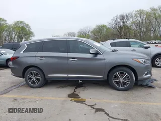 2019 Infiniti QX60 Pure z VIN 5N1DL0MN0KC516547, wystawiony jako IAAI lot #41947705 z przebiegiem 83 454 mil mil oraz . Historia ofert i sprzedaży dostępna na DreamBid. Obrazek 13.