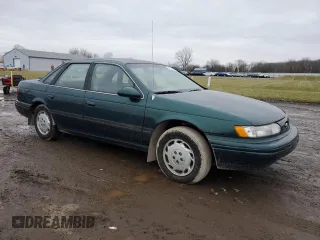 1995 Ford Taurus GL with VIN 1FALP52U1SA108202, listed as a Copart auction lot 85676434 with 102,669 mi miles and Salvage Title. Bid and sale history available at carsss.com. Image 4.