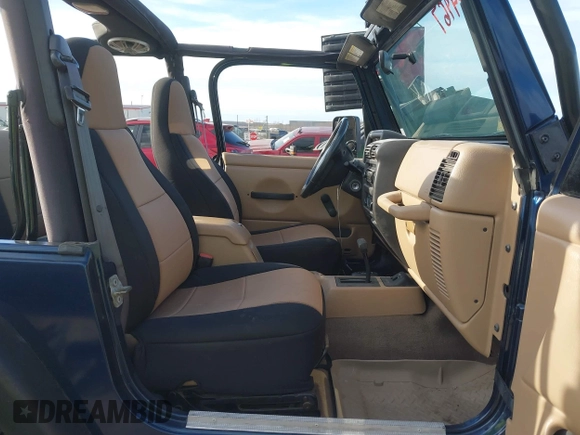 2001 Jeep Wrangler Sport with VIN 1J4FA49S41P334053, listed as a IAAI auction lot 41884967 with 158,258 mi miles. Bid and sale history available at carsss.com. Image 5.
