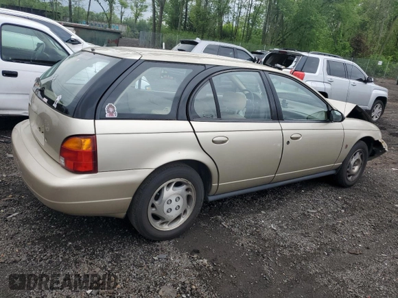 1997 Saturn SW z VIN 1G8ZK827XVZ120119, wystawiony jako Copart lot #57083245 z przebiegiem 199 971 mil mil oraz Szkoda całkowita • Salvage title. Historia ofert i sprzedaży dostępna na DreamBid. Obrazek 3.
