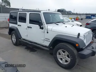 2017 Jeep Wrangler Unlimited Sport z VIN 1C4BJWDGXHL623183, wystawiony jako IAAI lot #42373238 z przebiegiem 98 972 mil mil oraz . Historia ofert i sprzedaży dostępna na DreamBid. Obrazek 1.