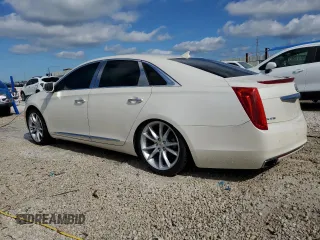 2013 Cadillac XTS Premium z VIN 2G61S5S32D9153013, wystawiony jako Copart lot #80877424 z przebiegiem Nie podano mil oraz Nie do naprawy. Historia ofert i sprzedaży dostępna na DreamBid. Obrazek 2.