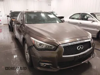 2015 Infiniti Q50 Premium z VIN JN1BV7ARXFM418280, wystawiony jako IAAI lot #42080879 z przebiegiem 126 411 mil mil oraz . Historia ofert i sprzedaży dostępna na DreamBid. Obrazek 6.