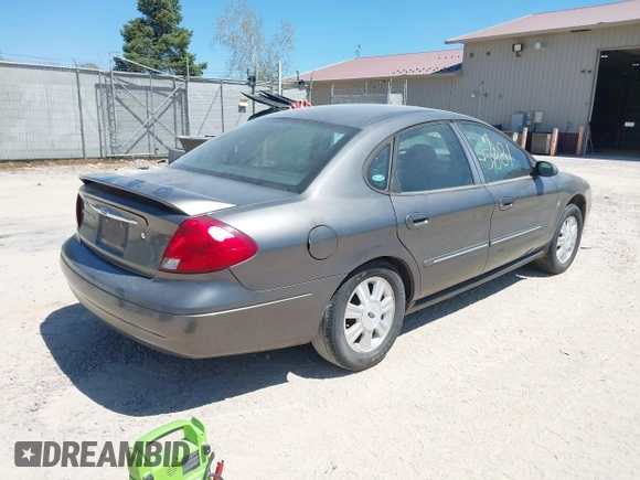 2003 Ford Taurus SEL Deluxe with VIN 1FAHP56SX3G103903, listed as a IAAI auction lot 42215781 with 185,042 mi miles and . Bid and sale history available at DreamBid. Image 4.