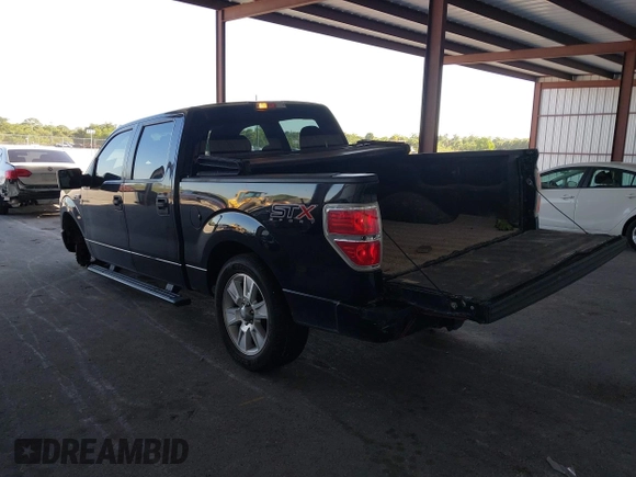 2014 Ford F-150 XL with VIN 1FTFW1CF9EKF87745, listed as a IAAI auction lot 42026883 with 221,307 mi miles. Bid and sale history available at carsss.com. Image 3.