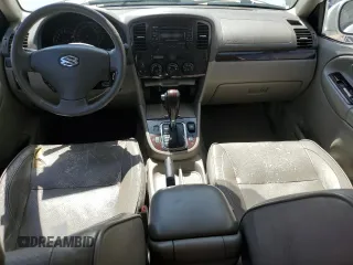 2004 Suzuki XL7 LX z VIN JS3TX92V344101698, wystawiony jako Copart lot #54610825 z przebiegiem 118 152 mil mil oraz Szkody całkowita. Historia ofert i sprzedaży dostępna na DreamBid. Obrazek 8.