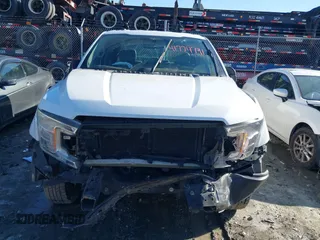 2019 Ford F-150 XL with VIN 1FTEW1C51KKC22877, listed as a IAAI auction lot 41774791 with 143,939 mi miles and . Bid and sale history available at DreamBid. Image 13.