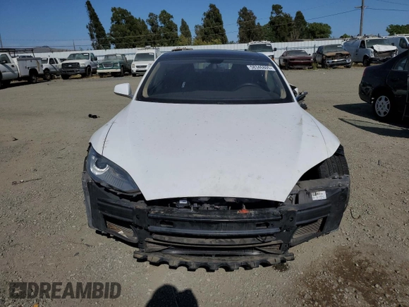 2014 Tesla Model S 60 z VIN 5YJSA1S11EFP41087, wystawiony jako Copart lot #58346805 z przebiegiem Nie podano mil oraz Szkoda całkowita • Salvage title. Historia ofert i sprzedaży dostępna na DreamBid. Obrazek 5.