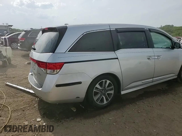 2014 Honda Odyssey Touring with VIN 5FNRL5H93EB034263, listed as a Copart auction lot 57254485 with 150,084 mi miles and Salvage title. Bid and sale history available at DreamBid. Image 14.