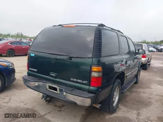 2003 Chevrolet Tahoe LT with VIN 1GNEC13Z03R268258, listed as a IAAI auction lot 41916956 with 218,720 mi miles. Bid and sale history available at carsss.com. Image 4.