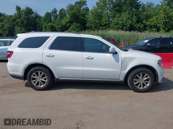 2015 Dodge Durango Limited with VIN 1C4RDHDGXFC789038, listed as a IAAI auction lot 42467998 with 122,932 mi miles and . Bid and sale history available at DreamBid. Image 14.