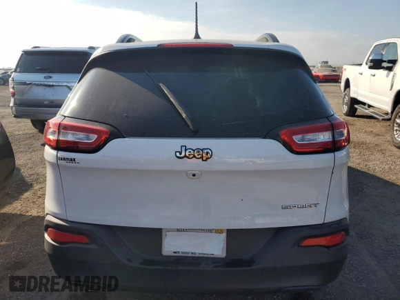 2016 Jeep Cherokee Altitude with VIN 1C4PJLAB6GW234549, listed as a Copart auction lot 58246085 with Not provided miles and Salvage title. Bid and sale history available at DreamBid. Image 6.